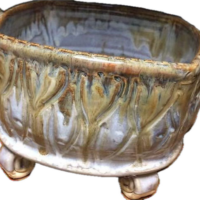 oval vessel with feet