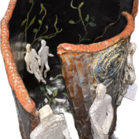 ceramic sculpture five human shapes inside a curved wall with vines and spirals